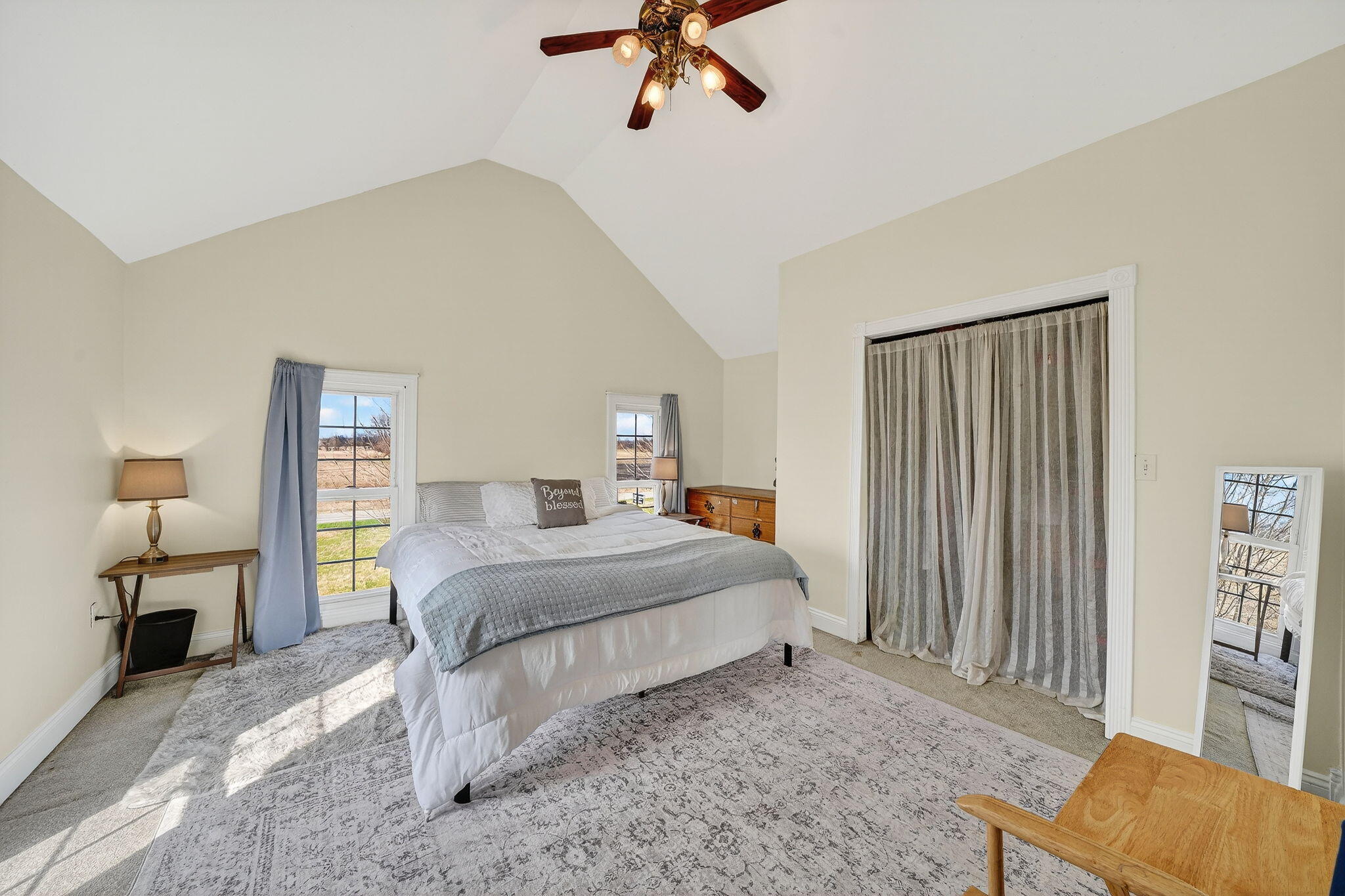 11403 Highway 10 Argos, IN 46501 - Photo 18 of 50 a bedroom with a bed and a chandelier