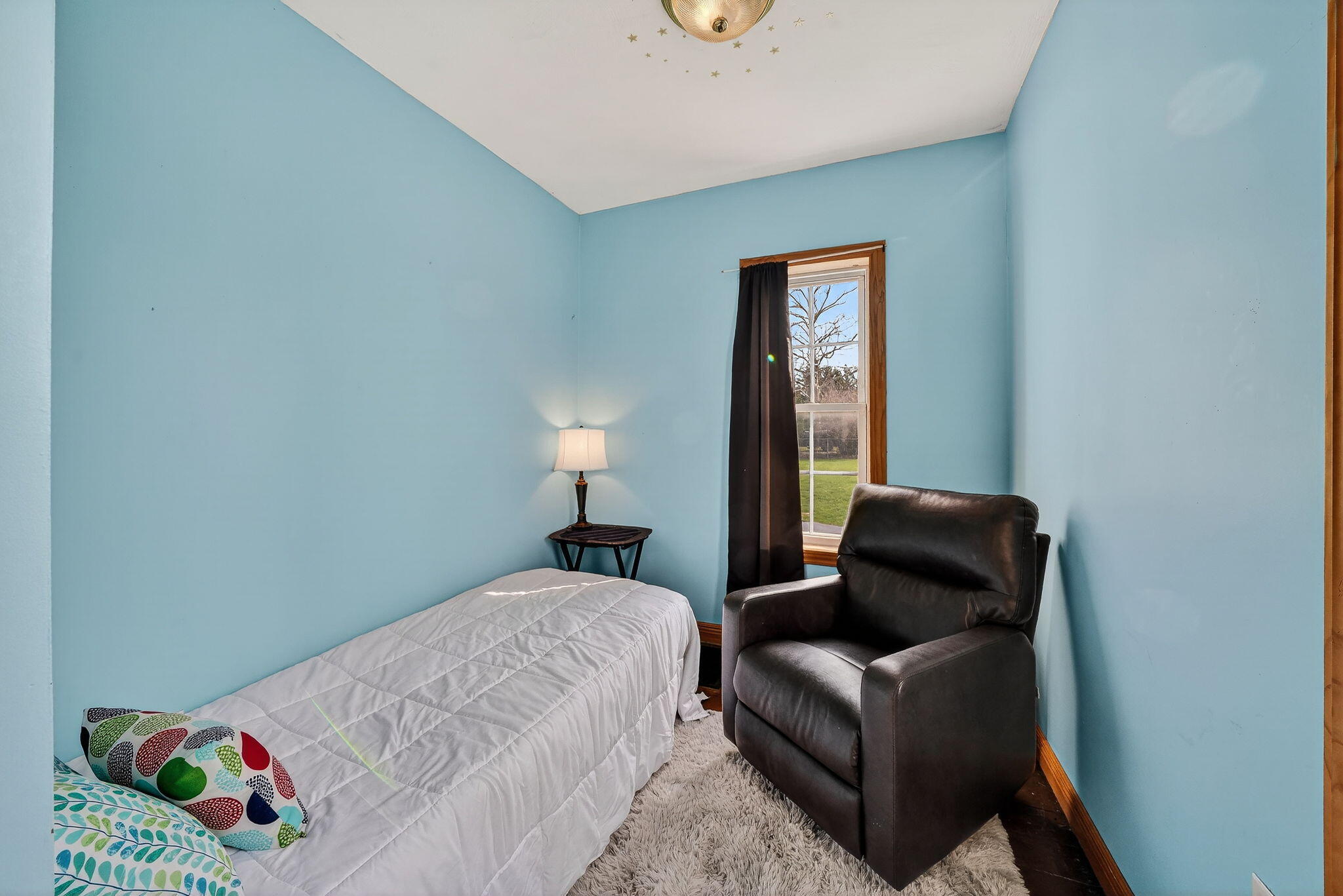11403 Highway 10 Argos, IN 46501 - Photo 21 of 50 a bedroom with a bed and a window