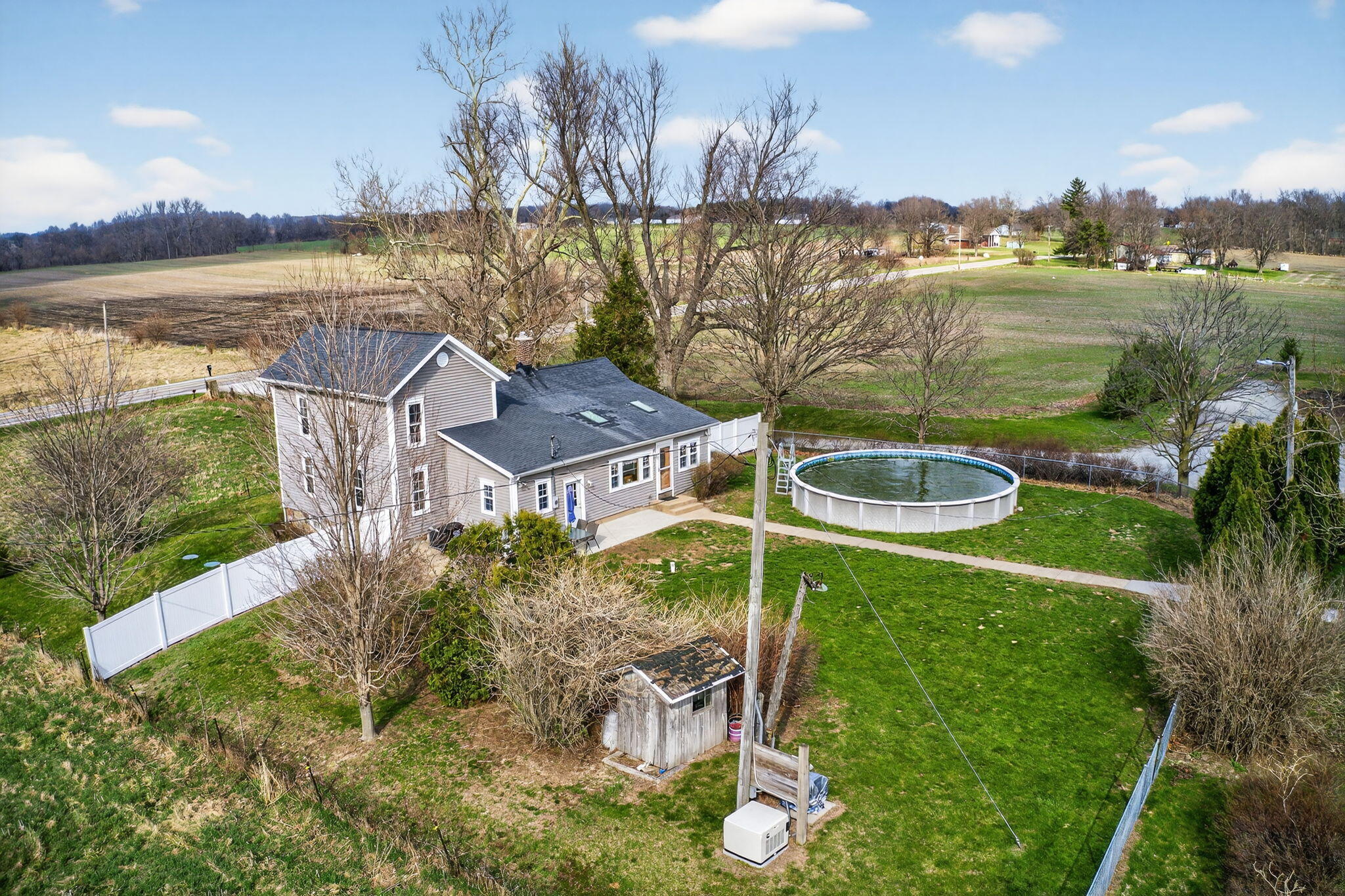 11403 Highway 10 Argos, IN 46501 - Photo 48 of 50 a view of a lake with a house in the background