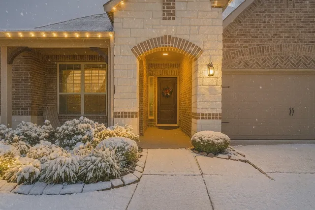 a view of a entryway door front of house