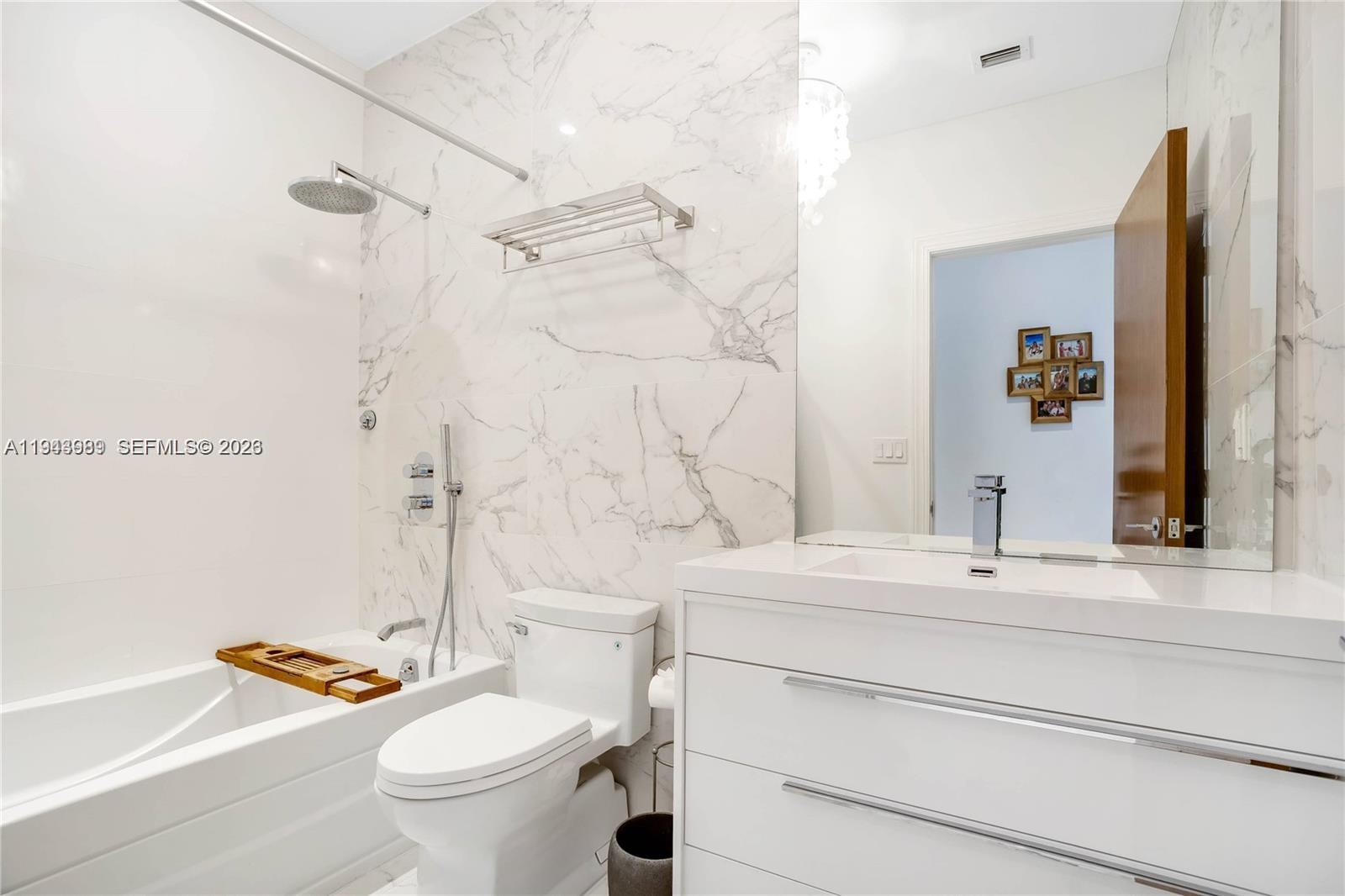 5911 Alton Road Miami Beach, FL 33140 - Photo 31 of 40 Third suite bathroom