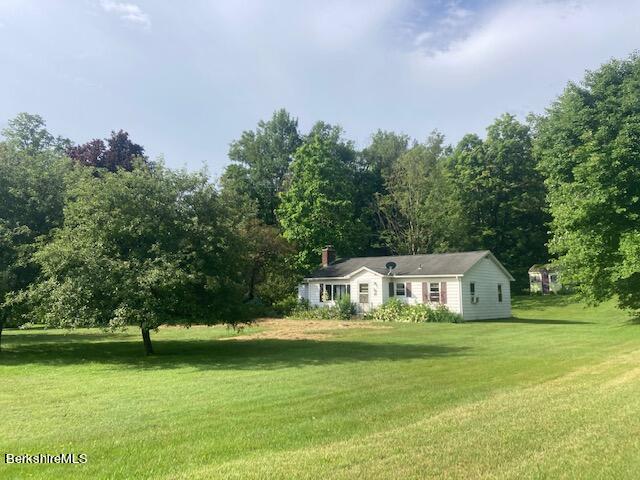 123 State Line Road West Stockbridge, MA 01266 - Photo 1 of 21 a front view of a house with garden