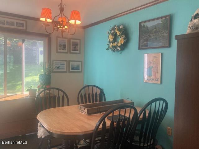 123 State Line Road West Stockbridge, MA 01266 - Photo 8 of 21 a view of a dining room with furniture and chandelier