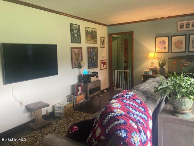 123 State Line Road West Stockbridge, MA 01266 - Photo 9 of 21 a living room with furniture and a flat screen tv