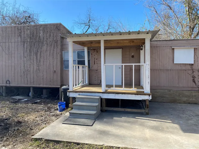 a view of house with outdoor space
