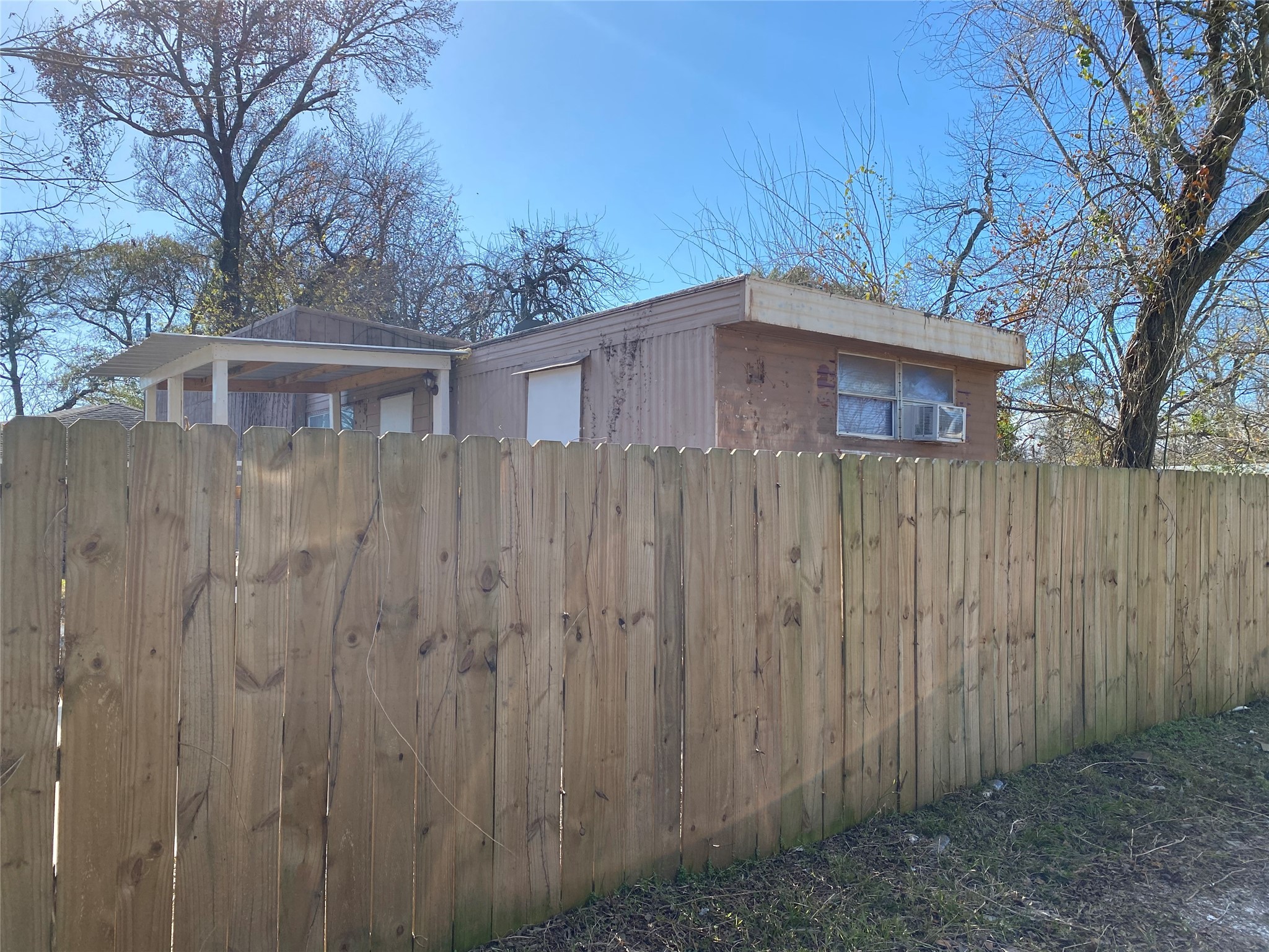 310 Harris Road, Unit B Highlands, TX 77562 - Photo 12 of 14 a backyard of a house
