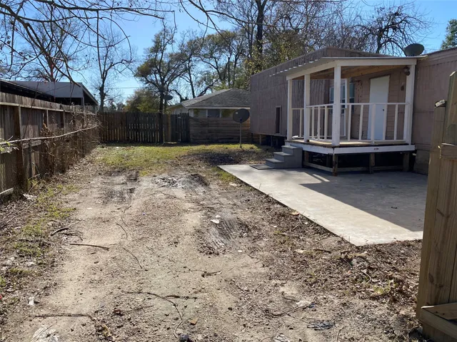 a view of backyard of house
