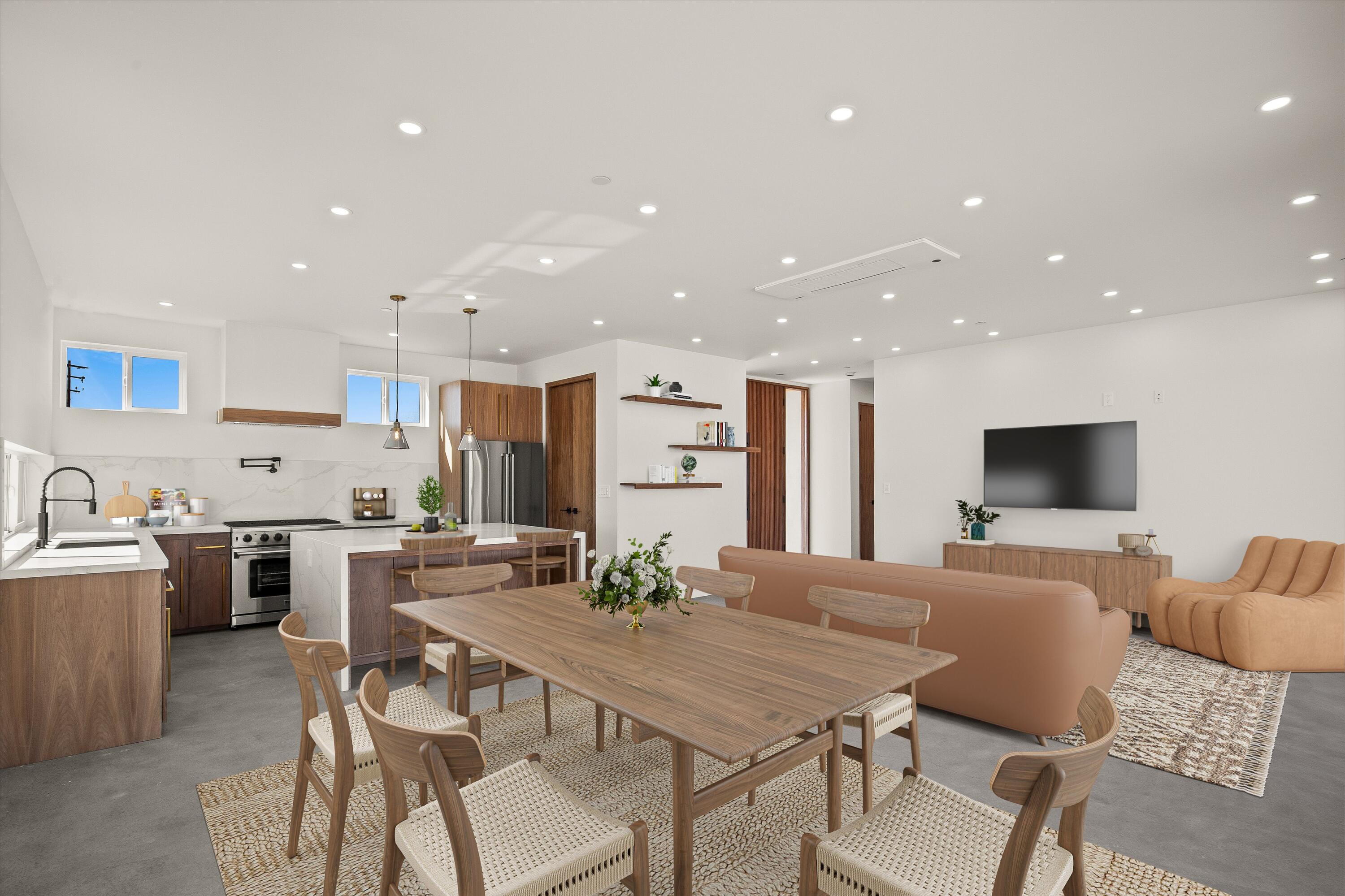 1925 Border Avenue Joshua Tree, CA 92252 - Photo 17 of 60 a large kitchen with a table and chairs