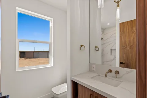 a view of a terrace with wooden floor and a city view