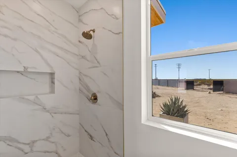 a view of house with swimming pool and outdoor space