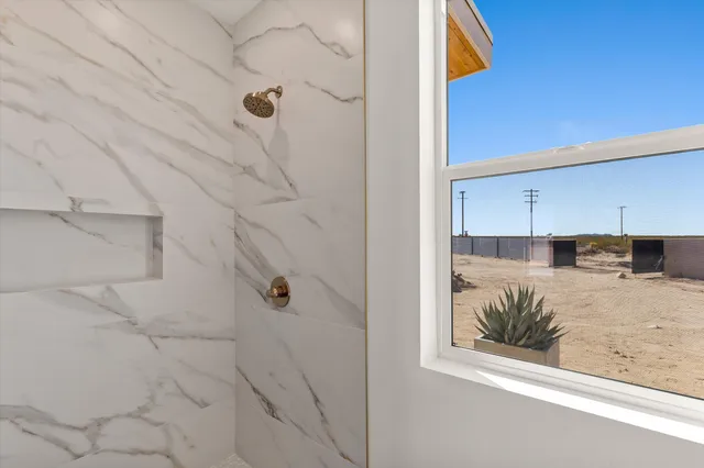 a view of house with swimming pool and outdoor space
