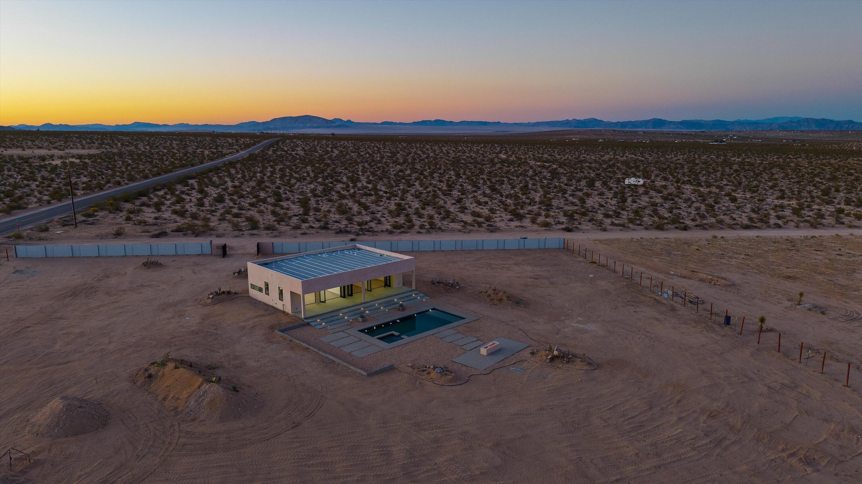 1925 Border Avenue Joshua Tree, CA 92252 - Photo 44 of 60 a view of a terrace with wooden floor and a city view
