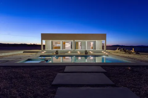 a view of balcony with wooden floor