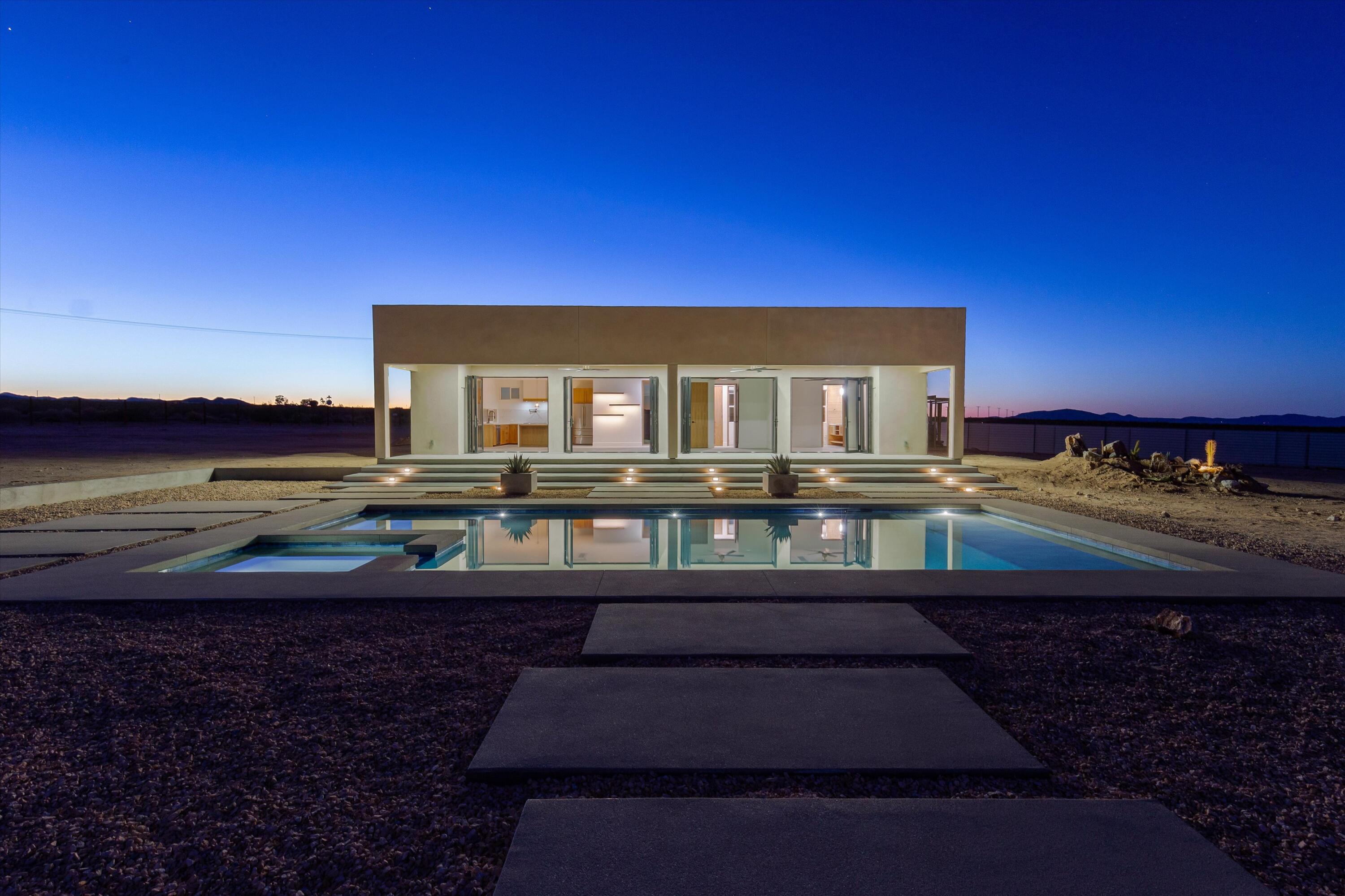 1925 Border Avenue Joshua Tree, CA 92252 - Photo 46 of 60 a front view of a house with a ocean view