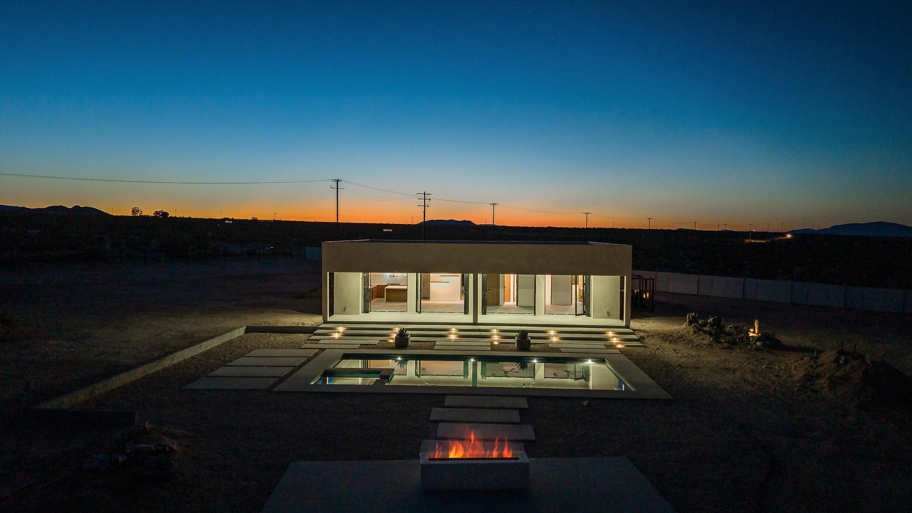 1925 Border Avenue Joshua Tree, CA 92252 - Photo 50 of 60 a car parked on the side of a building