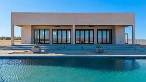 a view of house with yard