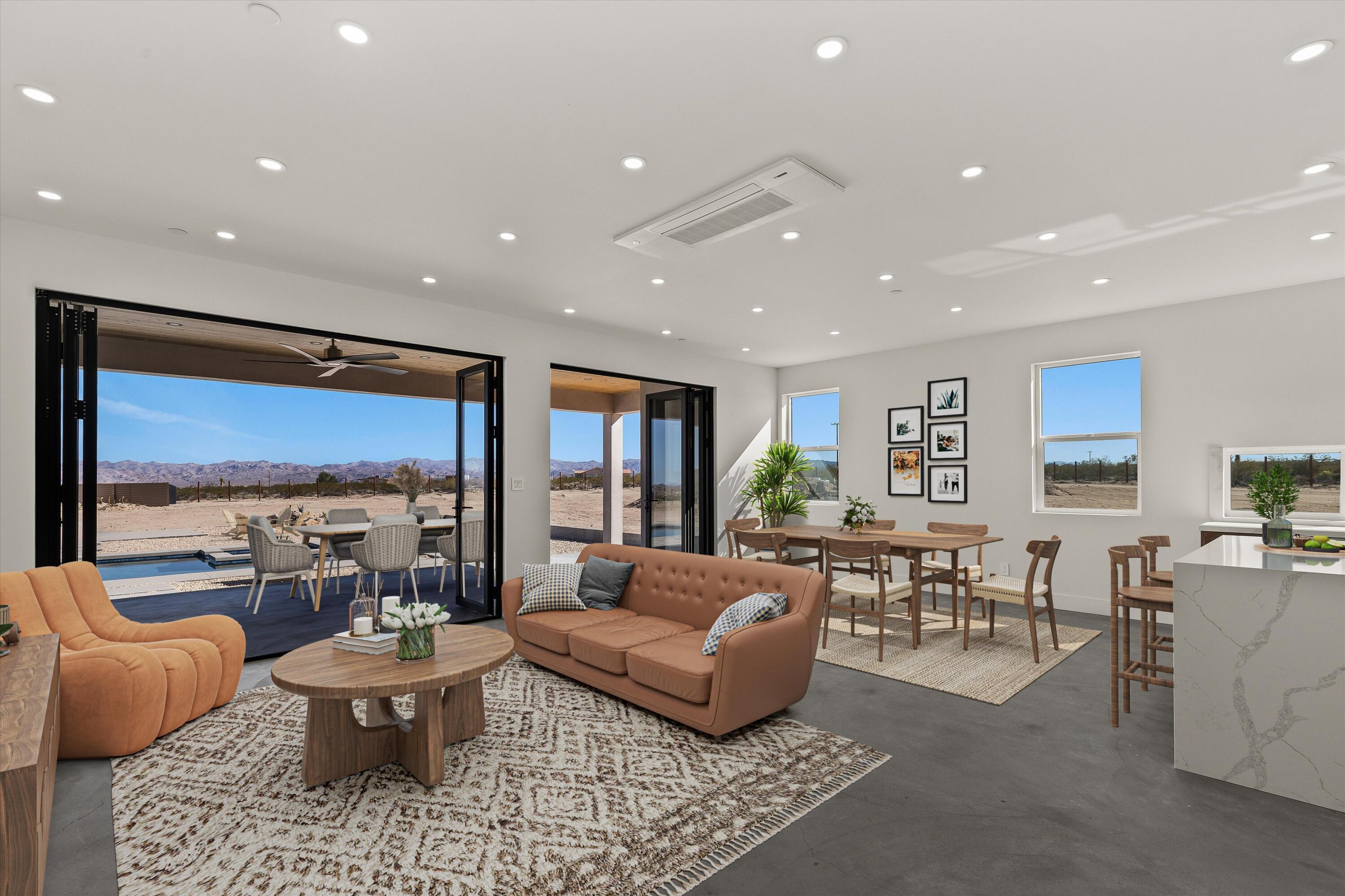 1925 Border Avenue Joshua Tree, CA 92252 - Photo 6 of 60 a living room with furniture and a large window
