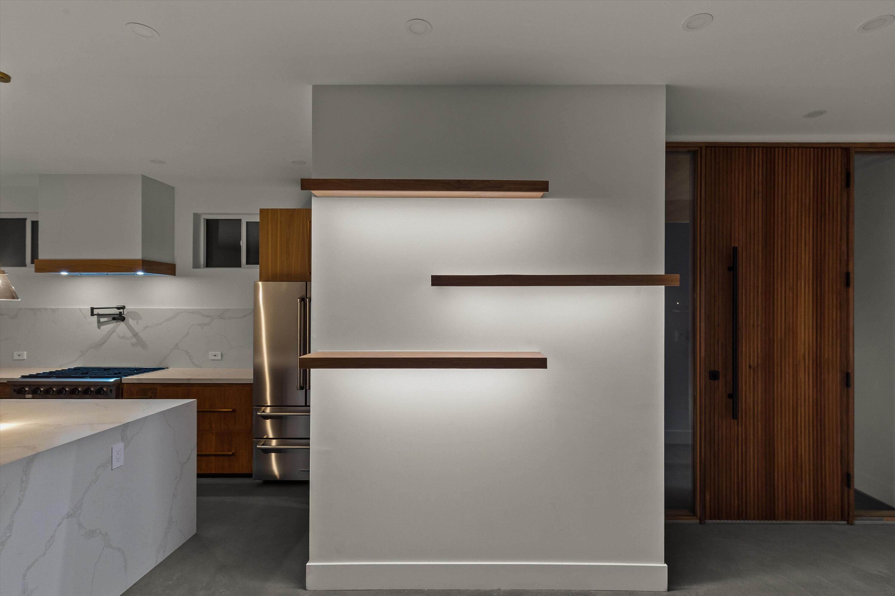 1925 Border Avenue Joshua Tree, CA 92252 - Photo 9 of 60 a kitchen with a refrigerator and a stove top oven