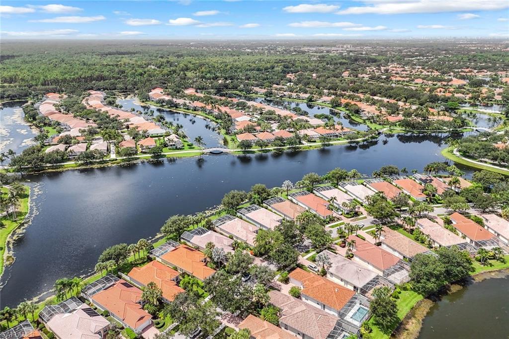 3794 Whidbey Way Naples, FL 34119 - Photo 2 of 46 an aerial view of city and lake view