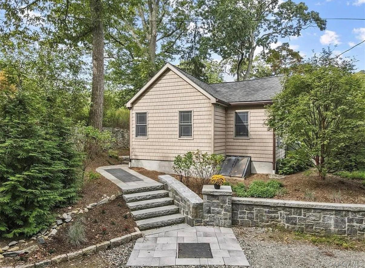 11 Oakdale Road Putnam Valley, NY 10579 - Photo 2 of 31 a view of a house with a yard and sitting area