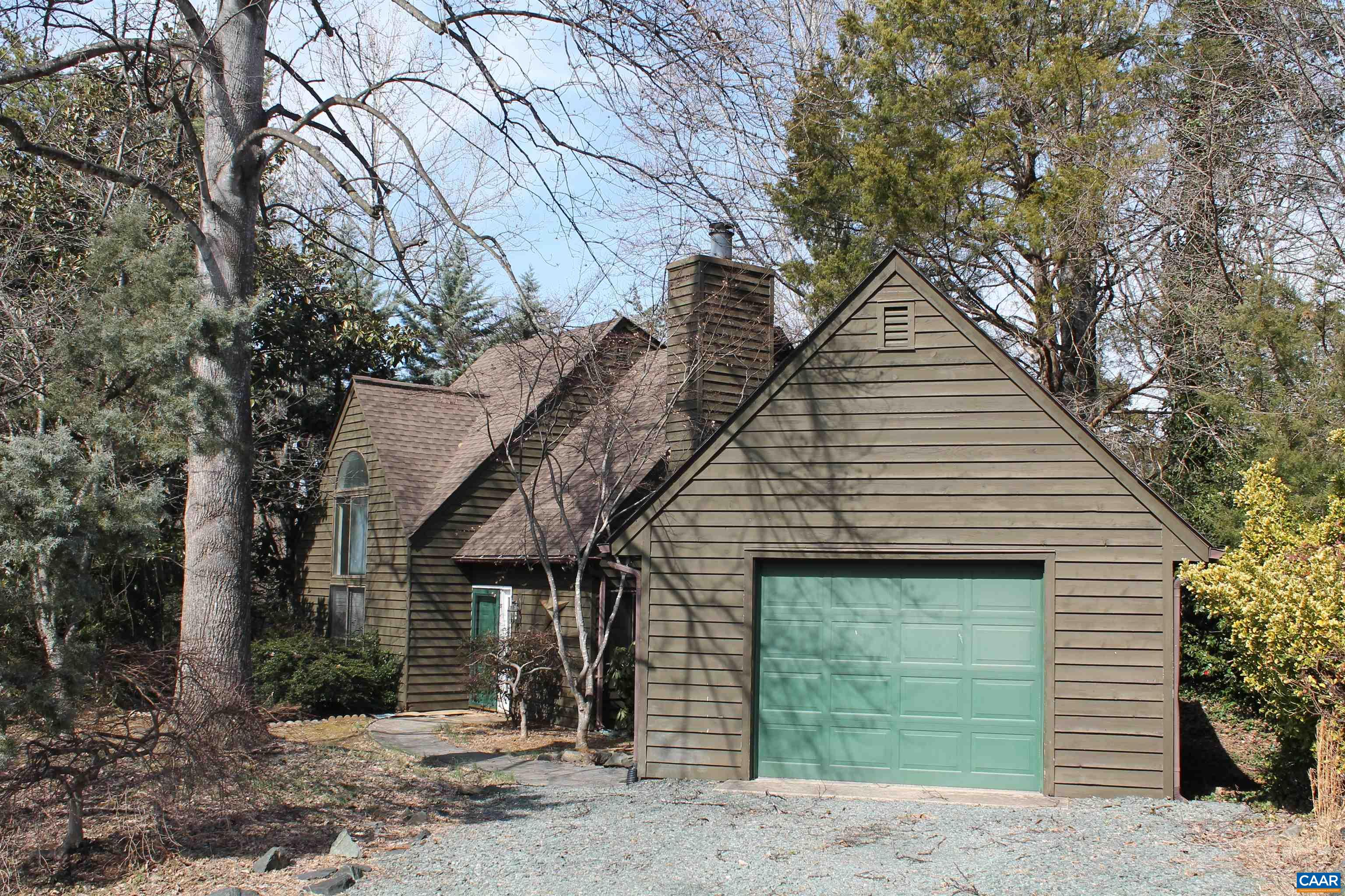 118 Mill Creek Drive Charlottesville, VA 22902 - Photo 1 of 30 a front view of a house with a yard and garage