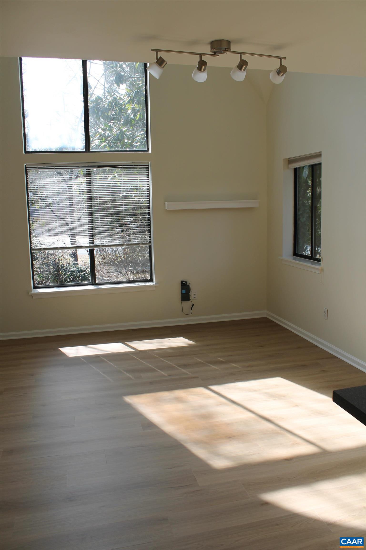 118 Mill Creek Drive Charlottesville, VA 22902 - Photo 16 of 30 a view of a room with wooden floor and next to a window