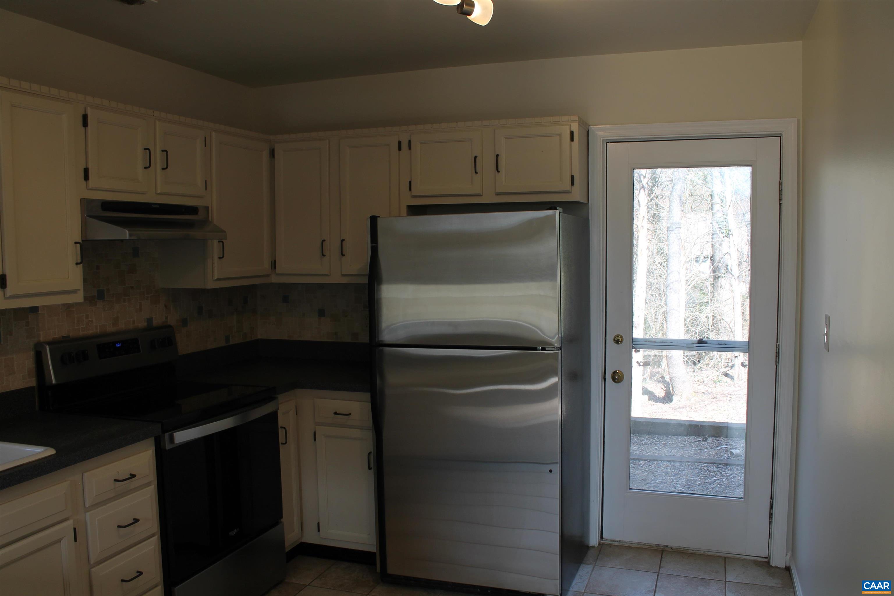 118 Mill Creek Drive Charlottesville, VA 22902 - Photo 17 of 30 a kitchen with appliances cabinets and a sink
