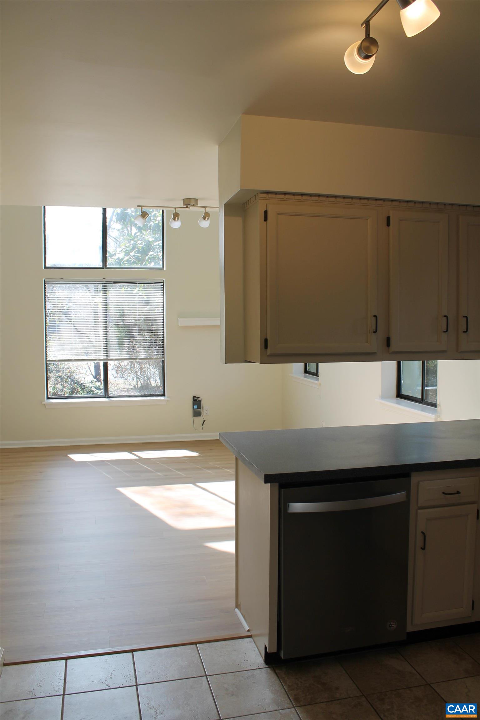 118 Mill Creek Drive Charlottesville, VA 22902 - Photo 20 of 30 a bathroom with a sink and a large mirror
