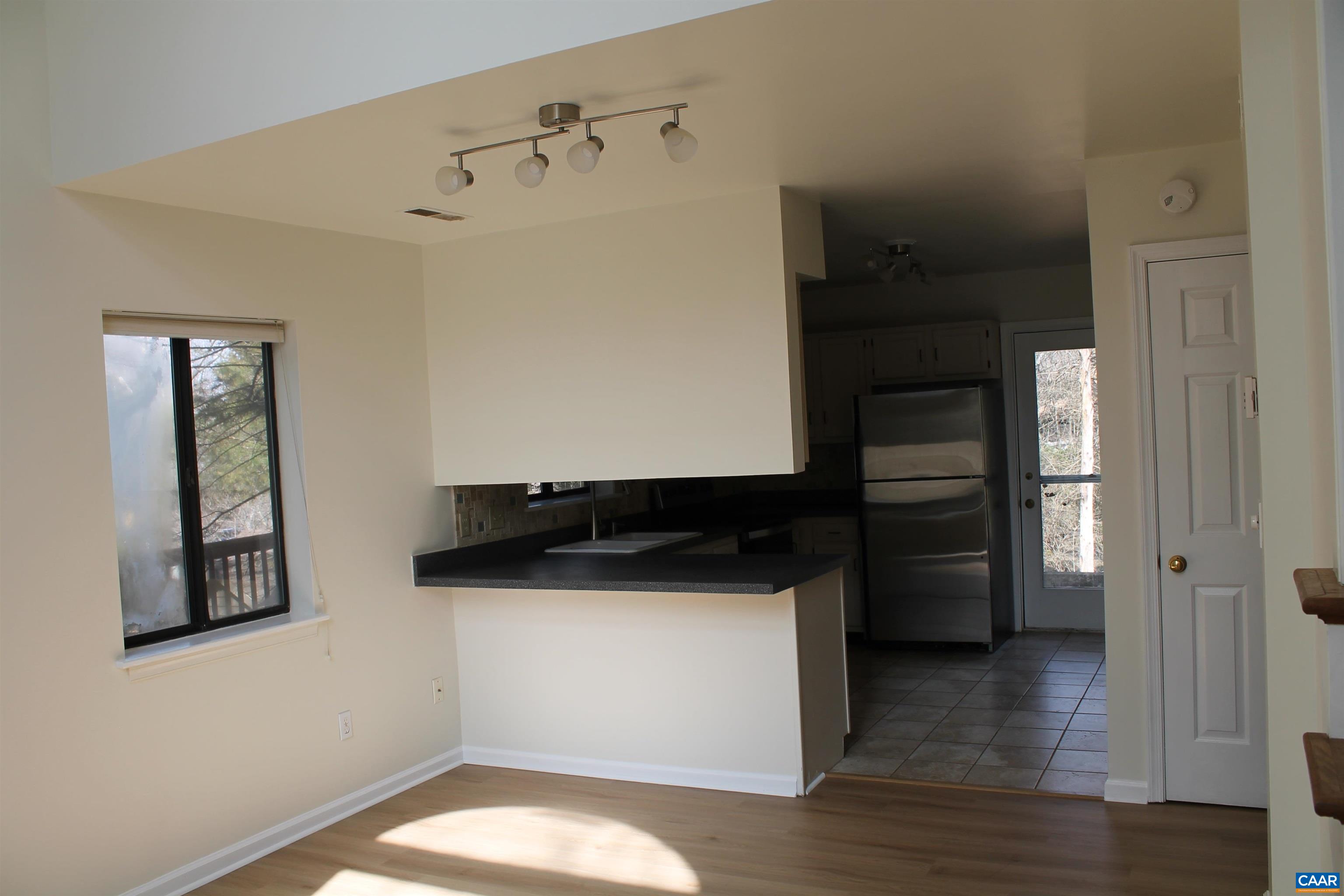 118 Mill Creek Drive Charlottesville, VA 22902 - Photo 24 of 30 a kitchen with a refrigerator and a stove