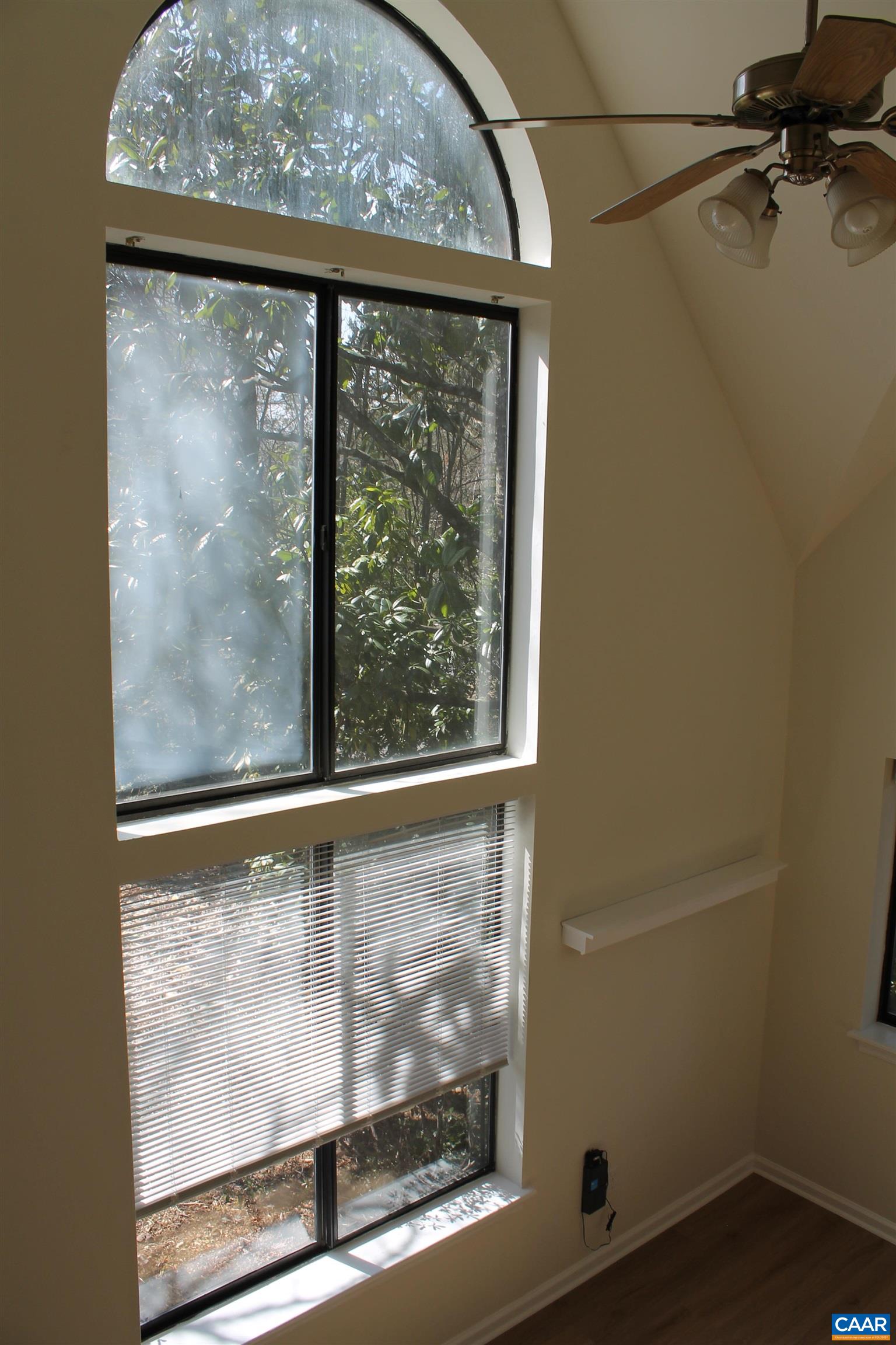 118 Mill Creek Drive Charlottesville, VA 22902 - Photo 25 of 30 a view of a room with a wooden floor and windows