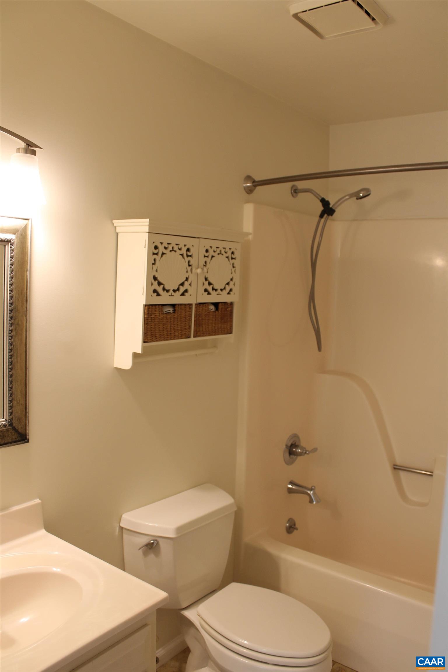 118 Mill Creek Drive Charlottesville, VA 22902 - Photo 27 of 30 a white toilet sitting next to a bath tub