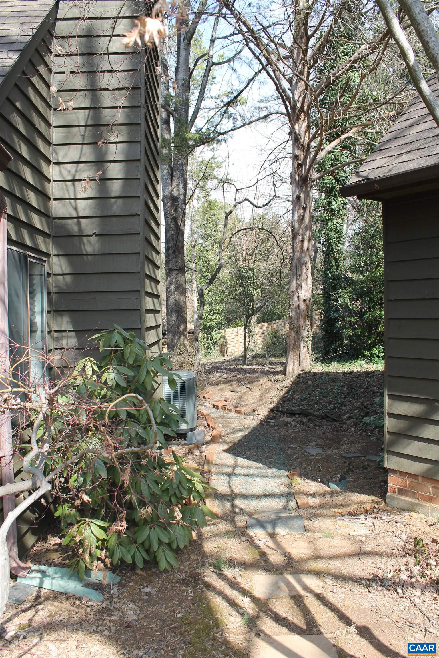 118 Mill Creek Drive Charlottesville, VA 22902 - Photo 6 of 30 a view of a yard with plants and trees
