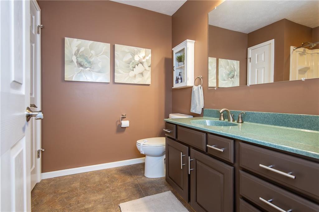25 Stinedurf Road West Middlesex, PA 16159 - Photo 19 of 25 FULL BATH NEARBY TO BEDROOM 2 & 3. WHITE DOORS, NEUTRAL PAINT. ALL VERY COMPLIMENTARY.