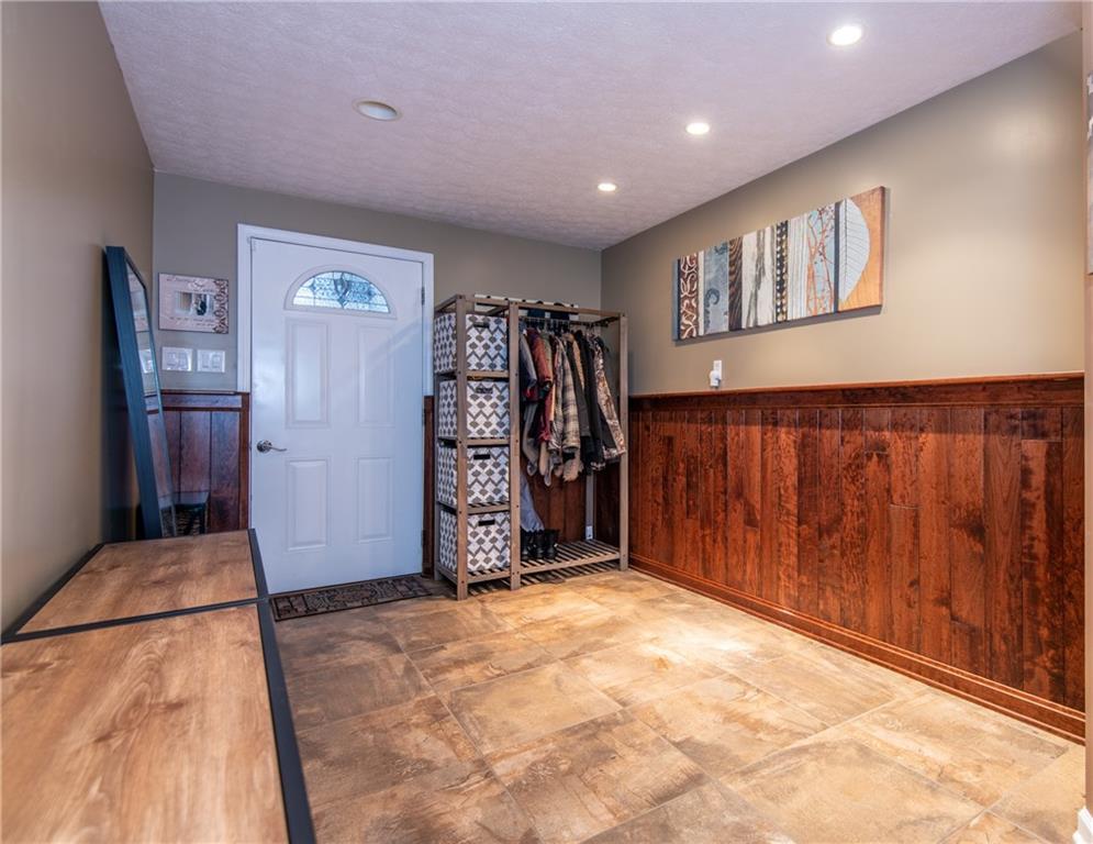 25 Stinedurf Road West Middlesex, PA 16159 - Photo 25 of 25 8X13 HALLWAY TO WALKOUT BASEMENT--COAT STORAGE & MISCELLANEOUS!