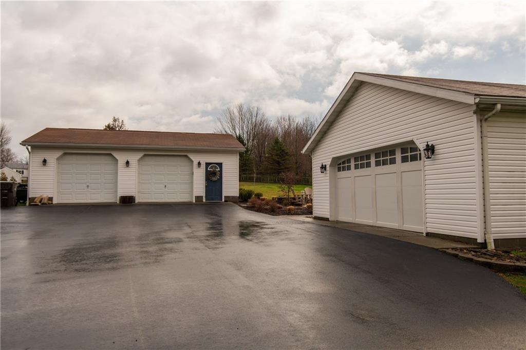 25 Stinedurf Road West Middlesex, PA 16159 - Photo 4 of 25 GARAGES GALORE!--2-CAR ATTACHED HEATED FARAGE GARAGE.... AND 2-CAR DETACHED GARAGE, INSULATED, DRY-WALLED! LOTS OF SPACE FOR VEHICLES & STORAGE.