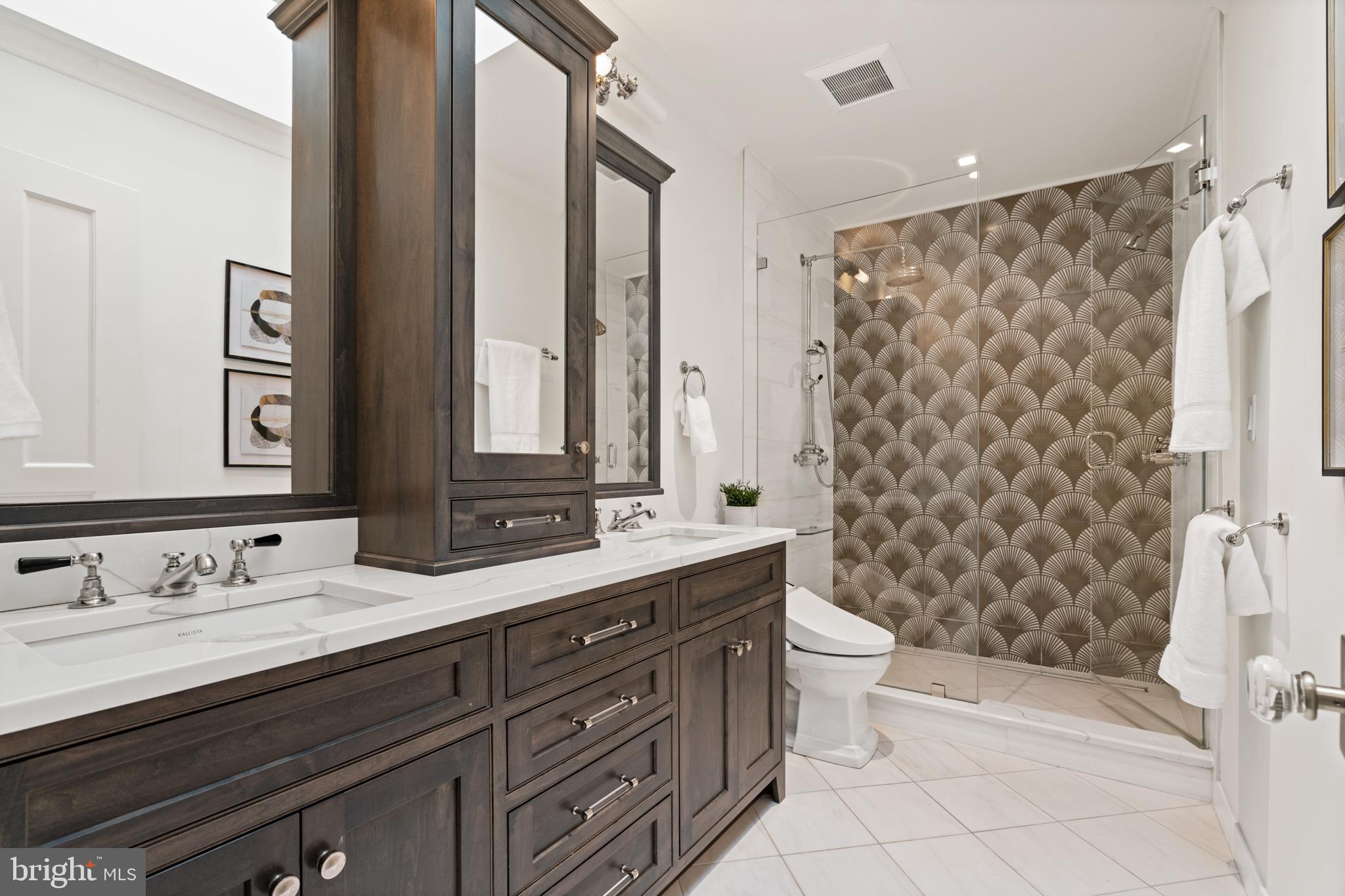 133 13th Street Northeast Washington, DC 20002 - Photo 14 of 41 a bathroom with a double vanity sink mirror and toilet