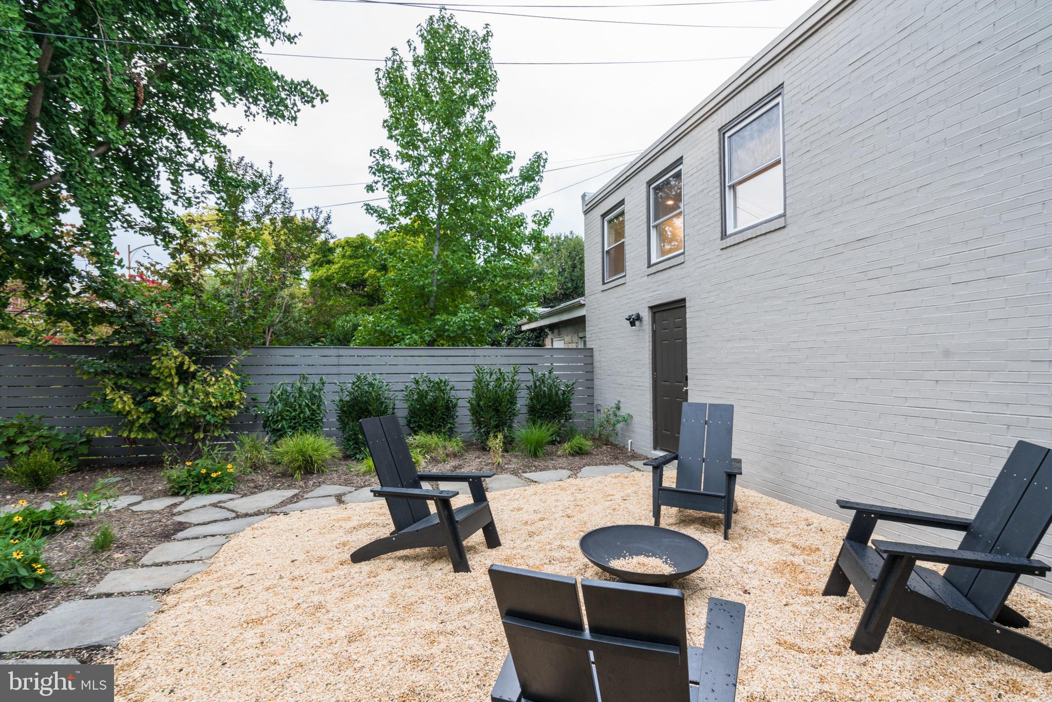 133 13th Street Northeast Washington, DC 20002 - Photo 31 of 41 a view of a patio with couple of chairs and a table