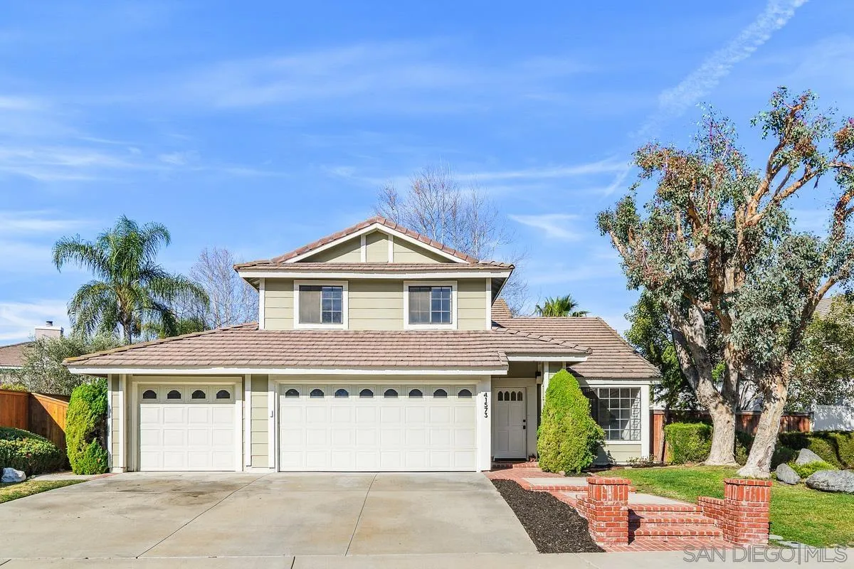 41573 Willow Run Road Temecula, CA 92591 - Photo 1 of 32 a front view of a house with a yard