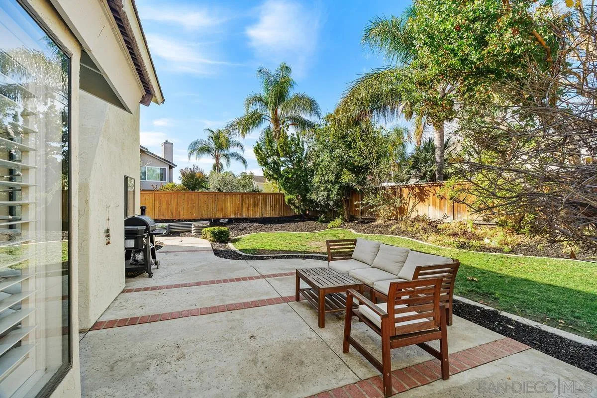 41573 Willow Run Road Temecula, CA 92591 - Photo 29 of 32 a view of backyard with seating area and green space