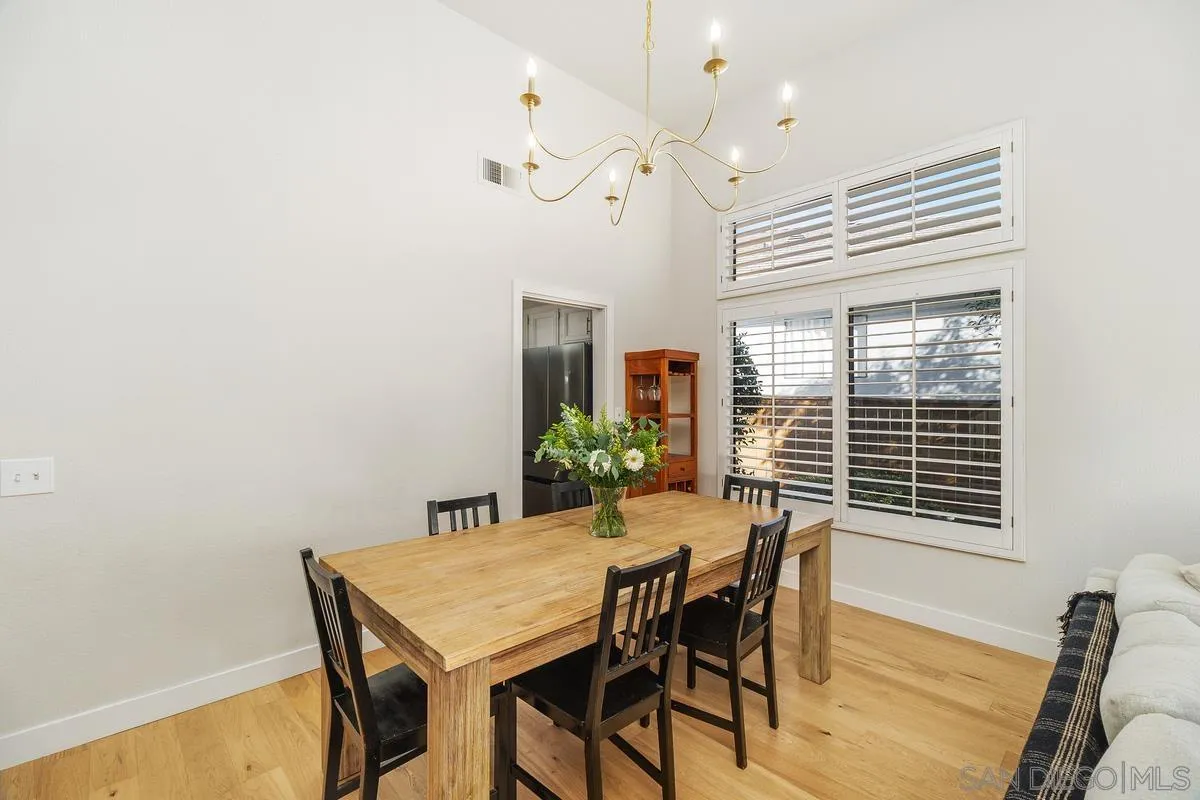 41573 Willow Run Road Temecula, CA 92591 - Photo 7 of 32 a view of a dining room with furniture and window
