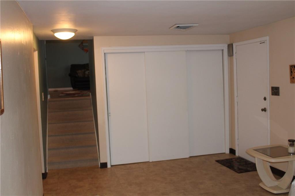 960 Lindsay Road Carnegie, PA 15106 - Photo 14 of 24 Front door opens to family room with plenty of closet space. Stairs lead to main level.