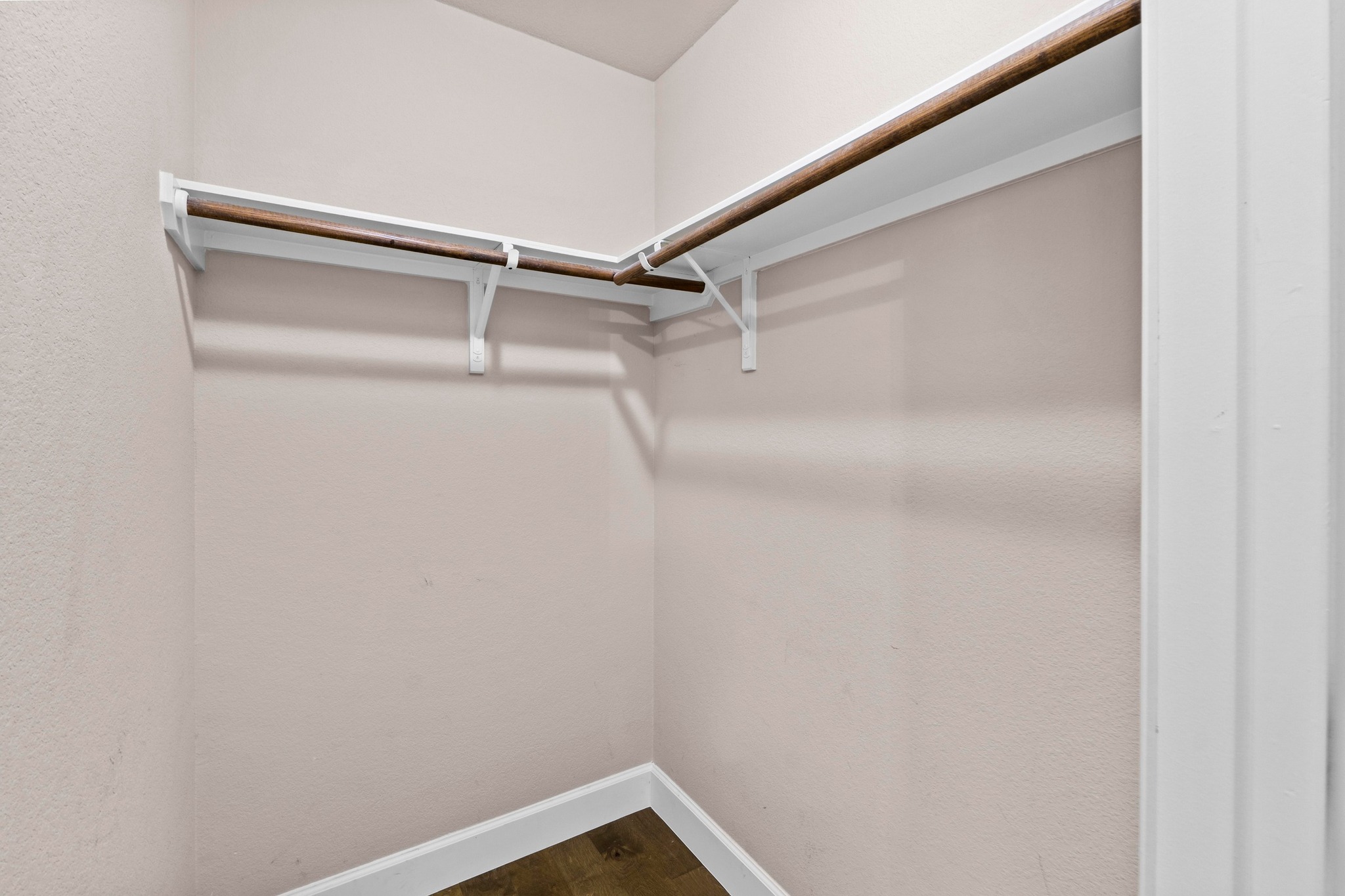 19004 Mangan Way Pflugerville, TX 78660 - Photo 25 of 38 Even the secondary bedrooms offer excellent storage solutions with walk in closet space.