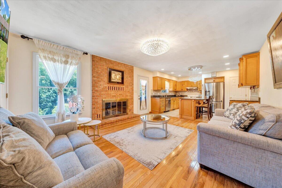 4434 Rosecrest Road Roanoke, VA 24018 - Photo 13 of 48 a living room with furniture and a fireplace
