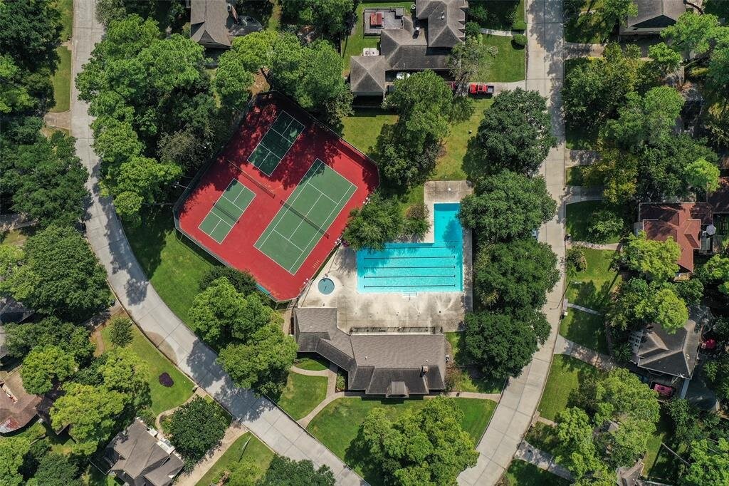 5910 Center Ct Drive Spring, TX 77379 - Photo 48 of 50 Cool off at the Spring Creek Oaks pool, gather with neighbors at the clubhouse, or enjoy a friendly game on the tennis courts.
