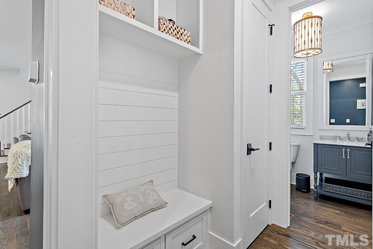 3025 Lewis Farm Road Raleigh, NC 27607 - Photo 11 of 42 a bathroom with a sink and a mirror