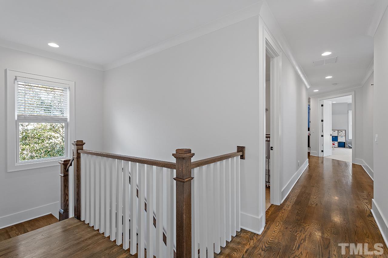 3025 Lewis Farm Road Raleigh, NC 27607 - Photo 18 of 42 a view of a hallway with a window