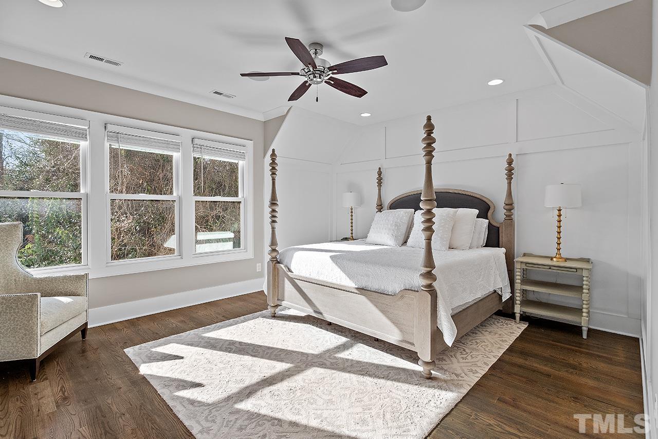 3025 Lewis Farm Road Raleigh, NC 27607 - Photo 20 of 42 a bed room with a bed and a window