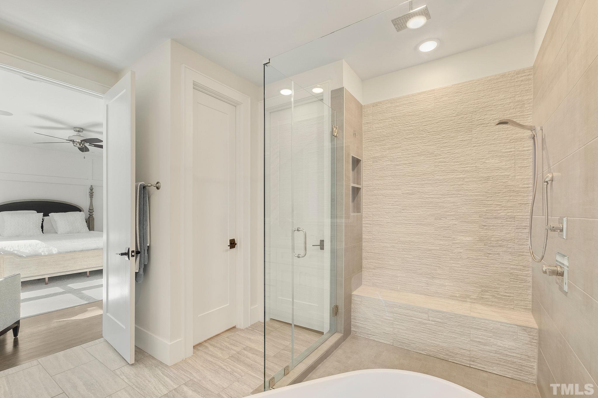 3025 Lewis Farm Road Raleigh, NC 27607 - Photo 22 of 42 a bathroom with a shower and a sink