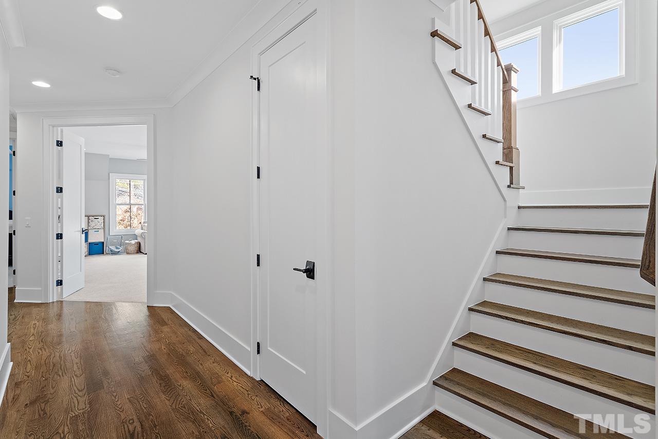 3025 Lewis Farm Road Raleigh, NC 27607 - Photo 32 of 42 a view of entryway with wooden floor