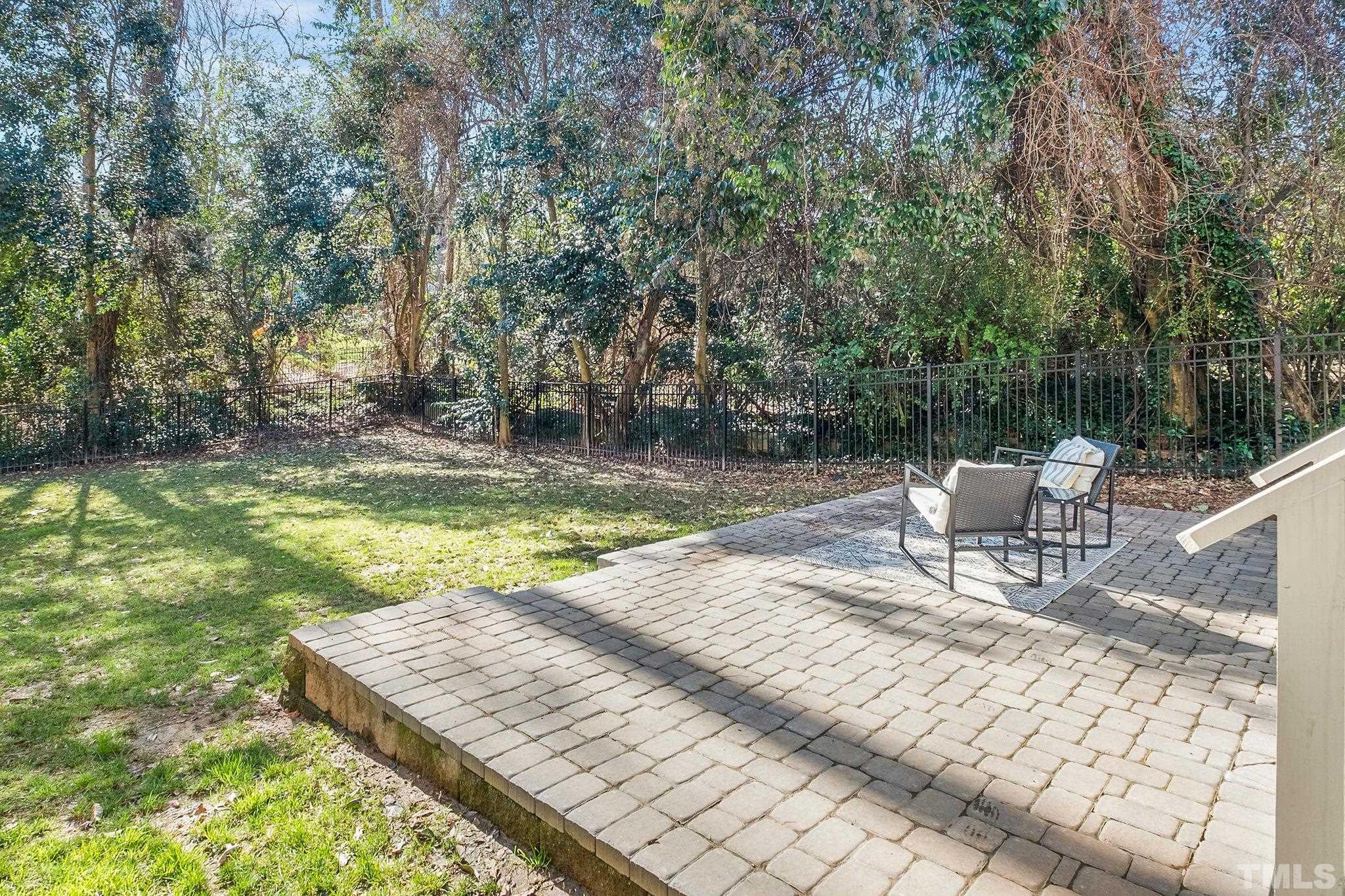 3025 Lewis Farm Road Raleigh, NC 27607 - Photo 38 of 42 a view of a swimming pool with chairs